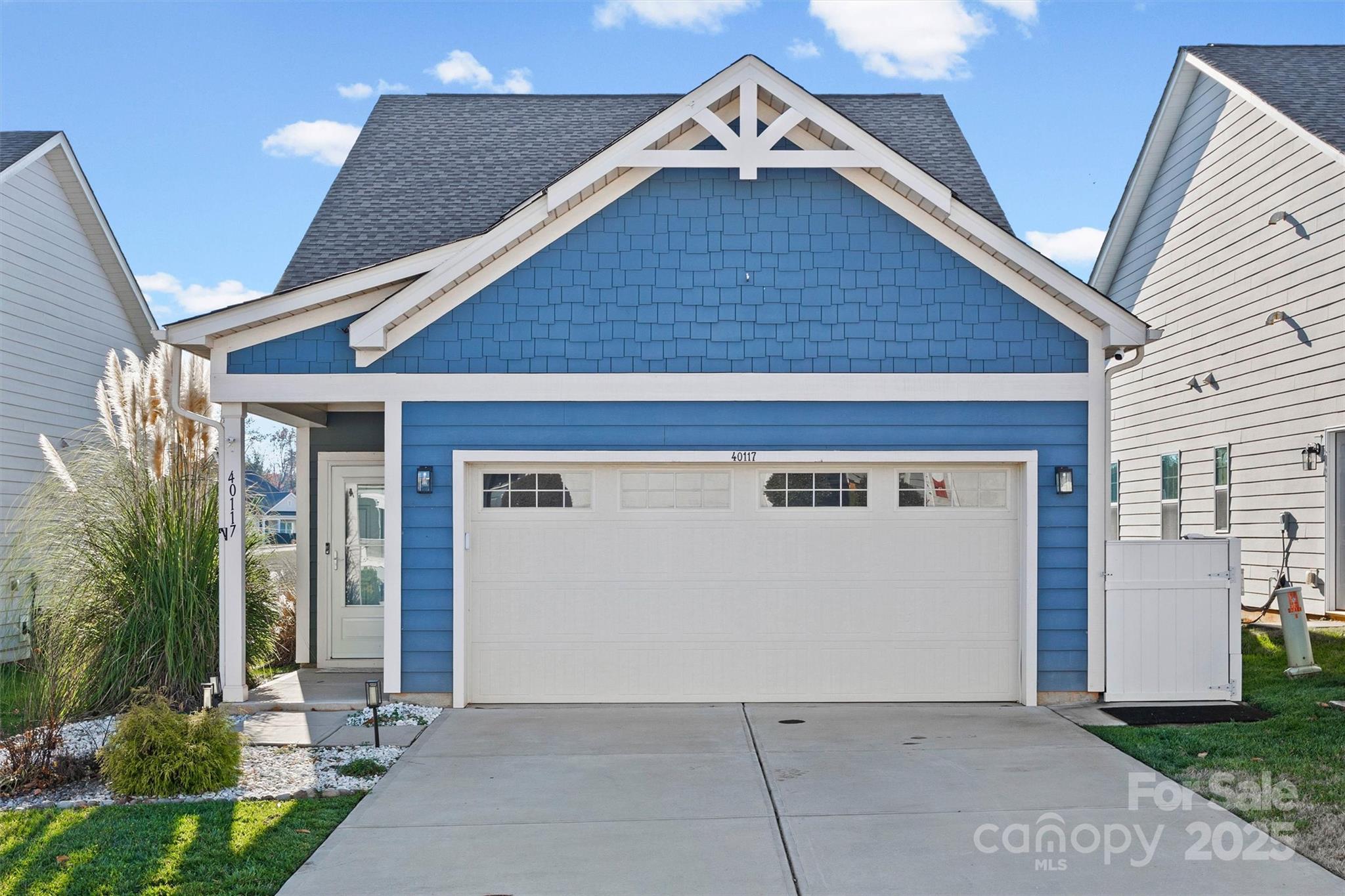 a view of house with garage