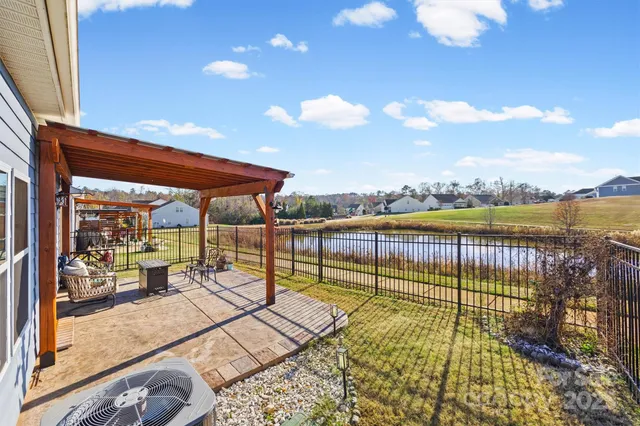 a view of a swimming pool with a lounge chairs