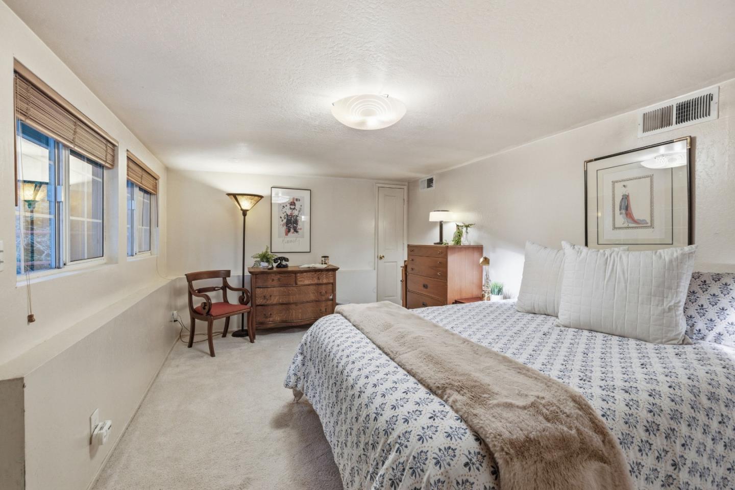 495 Primavera Road Boulder Creek, CA 95006 - Photo 6 of 36 a bedroom with a bed and a couch