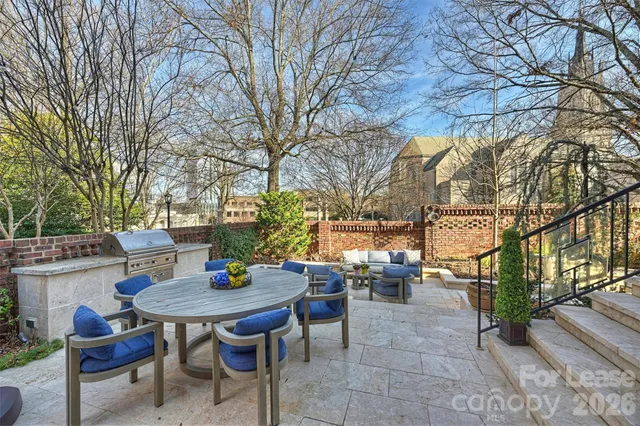 a view of a table and chairs in the patio