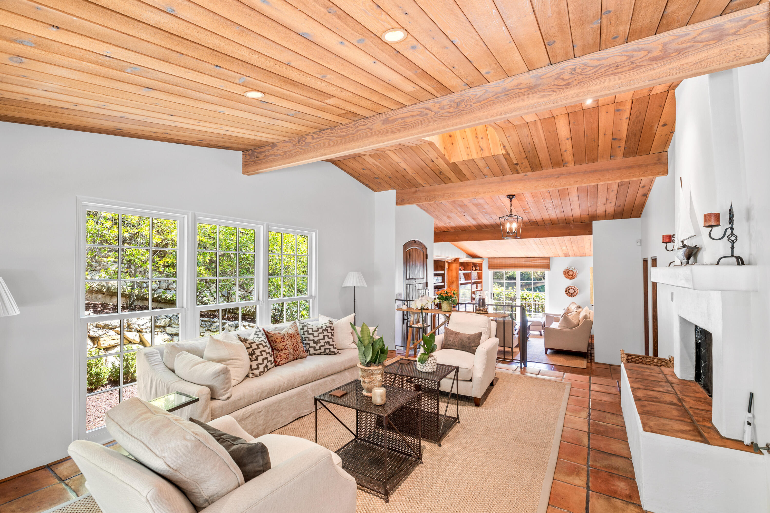 853 Jimeno Road Santa Barbara, CA 93103 - Photo 11 of 27 a living room with furniture and a fireplace