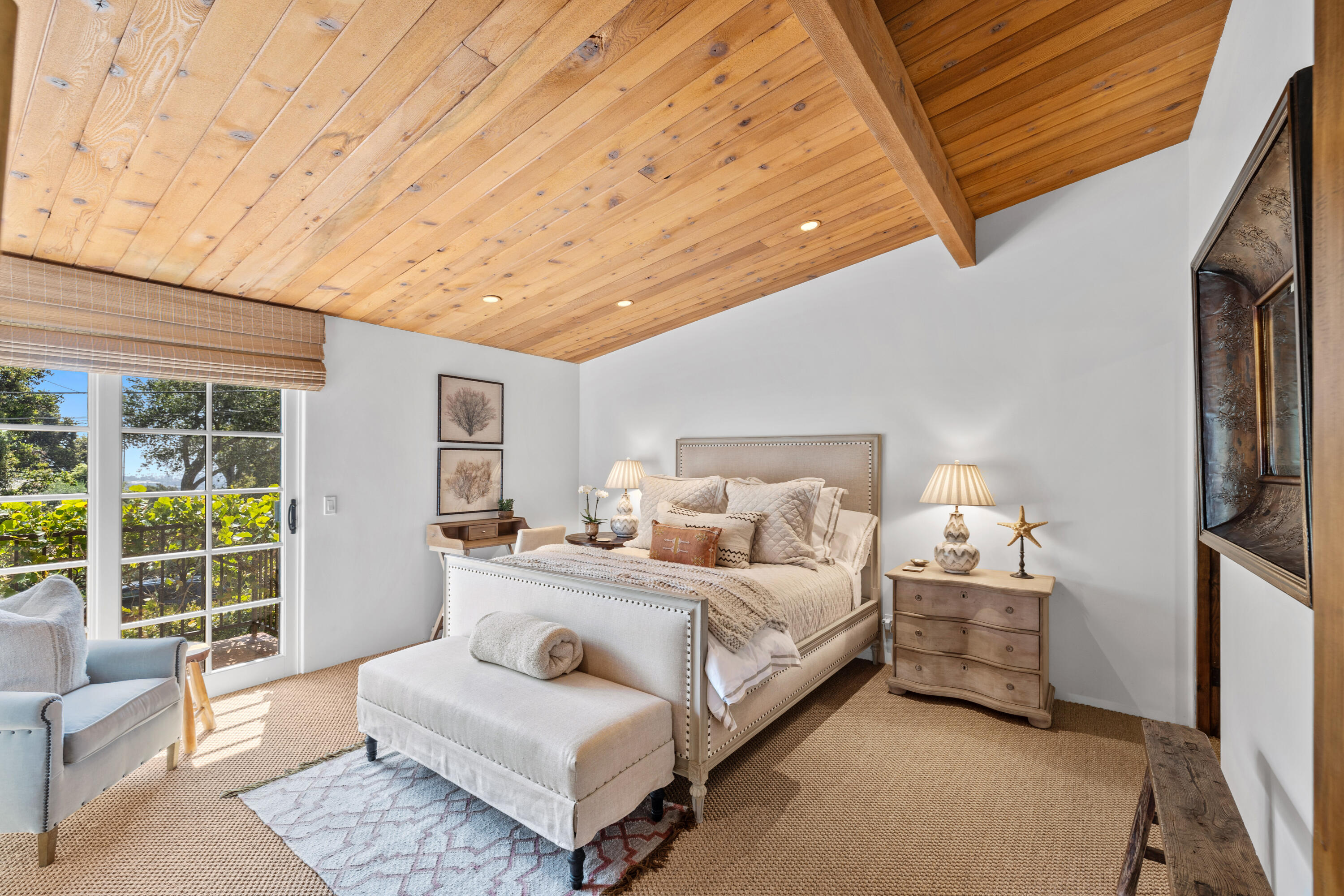 853 Jimeno Road Santa Barbara, CA 93103 - Photo 22 of 27 a bedroom with a bed and a couch