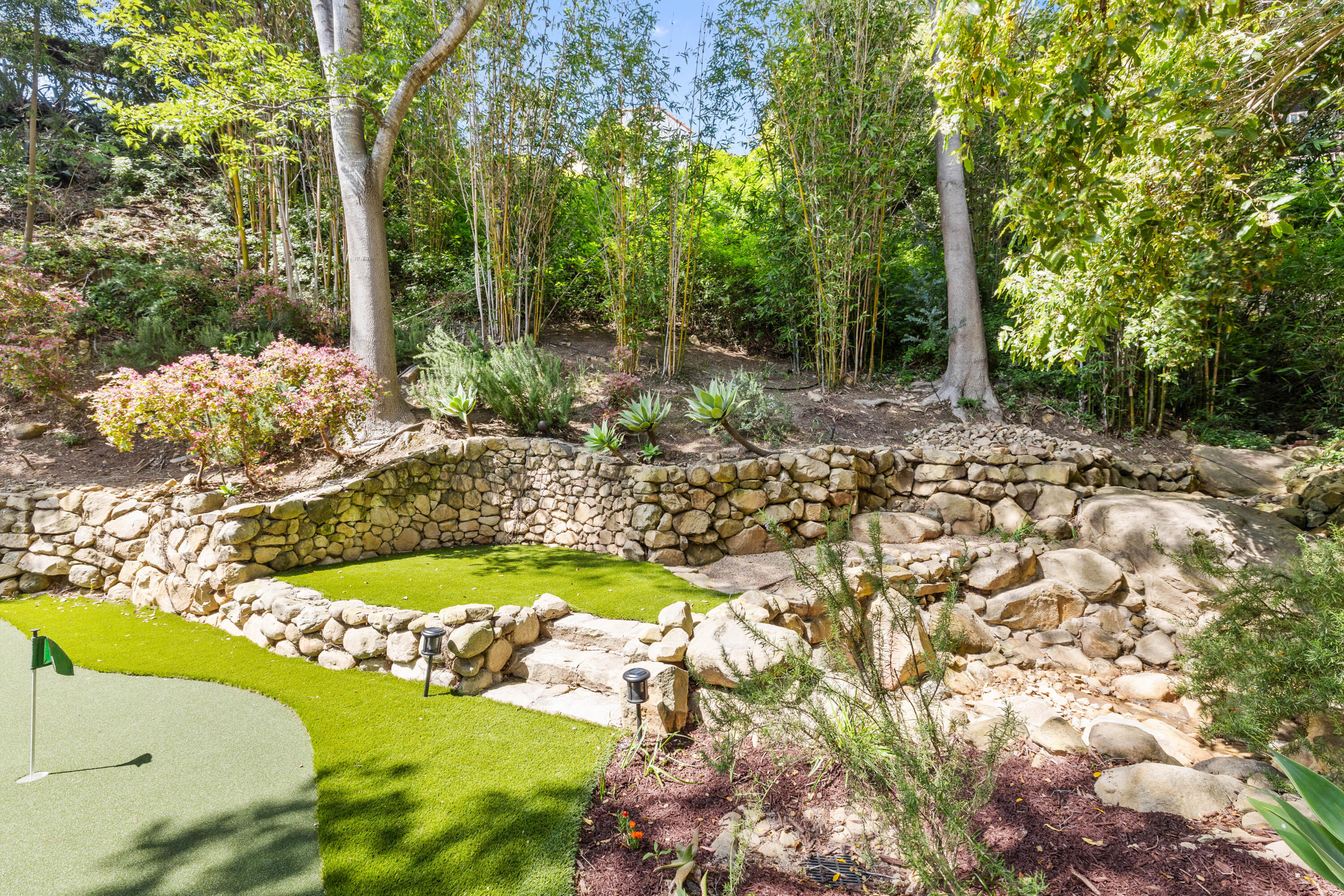853 Jimeno Road Santa Barbara, CA 93103 - Photo 25 of 27 a view of a tree with a yard