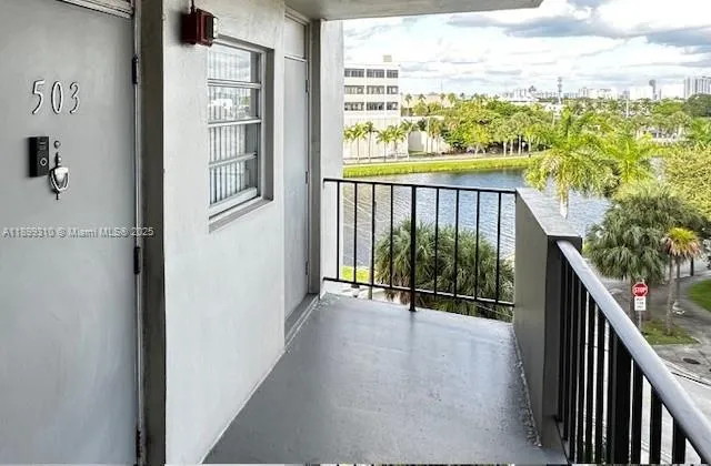 a view of a balcony with an outdoor space