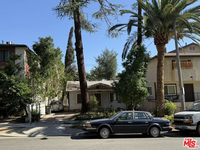 a car parked in front of a house