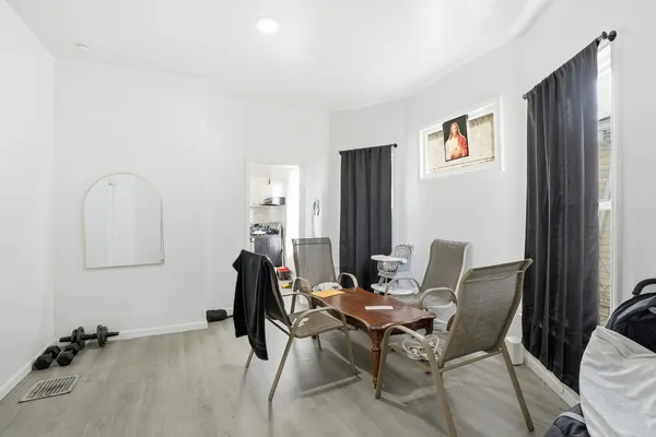 a workspace with furniture and bathroom