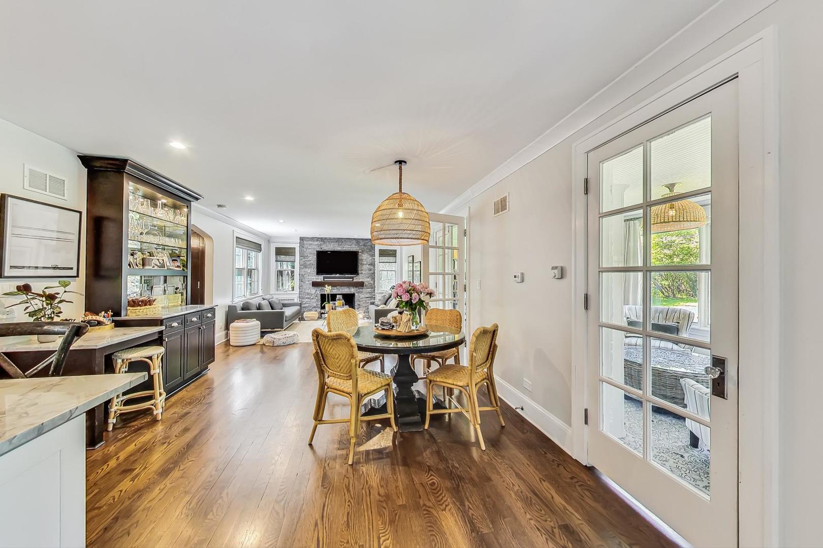 12 Timber Lane Northbrook, IL 60062 - Photo 8 of 28 a view of a dining room with furniture window and wooden floor