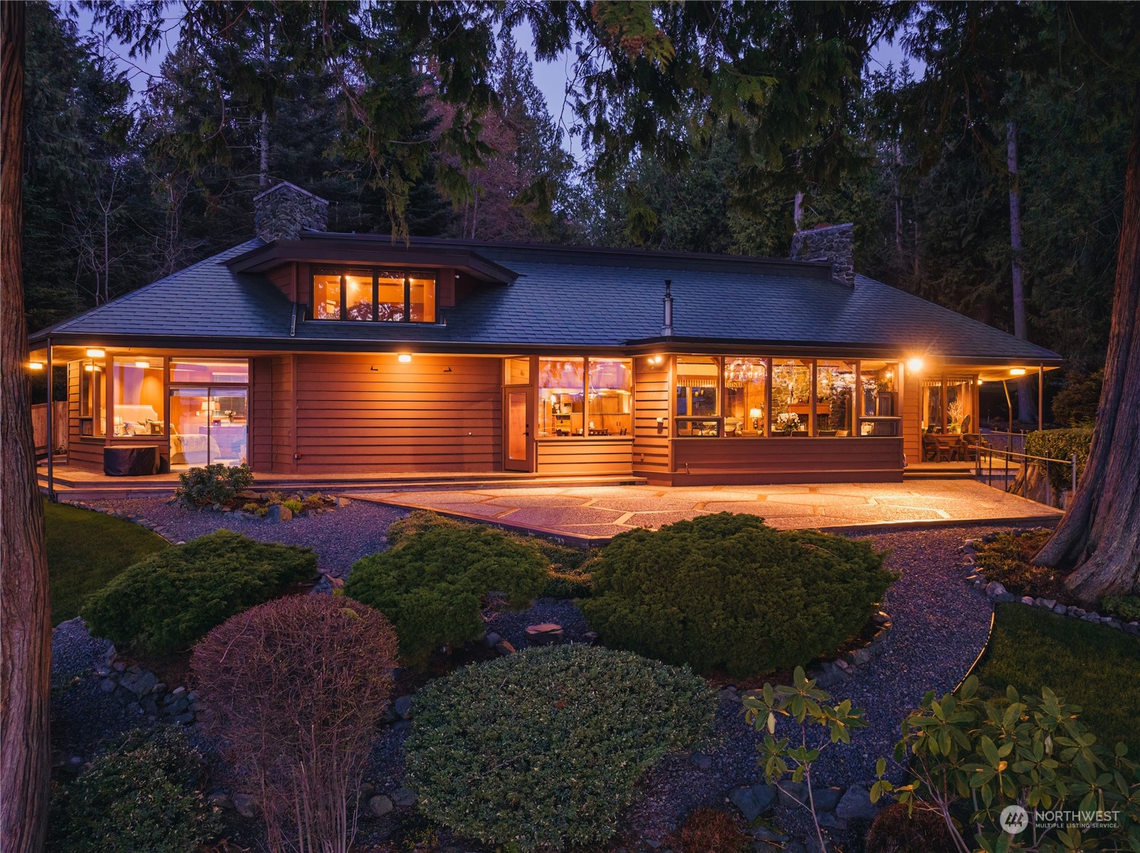 a view of swimming pool with outdoor seating and yard