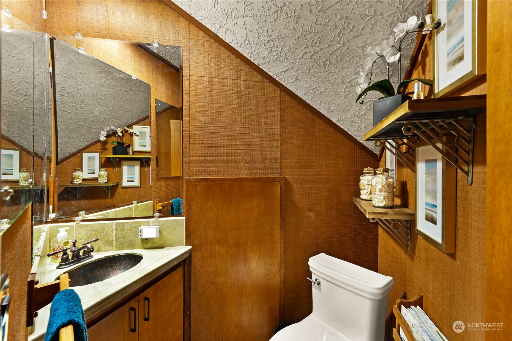 3559 Biz Point Road Anacortes, WA 98221 - Photo 20 of 37 a bathroom with a sink a toilet and mirror