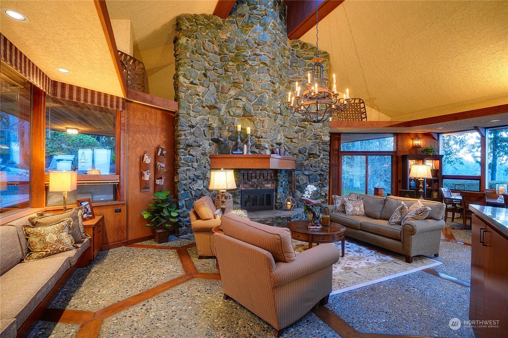 3559 Biz Point Road Anacortes, WA 98221 - Photo 27 of 37 a view of a patio with couches chairs dining table and chairs