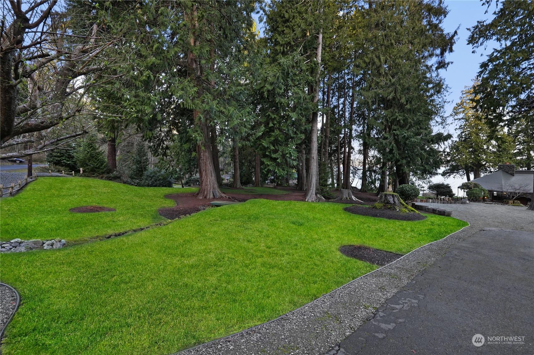 3559 Biz Point Road Anacortes, WA 98221 - Photo 34 of 37 a view of a park with large trees
