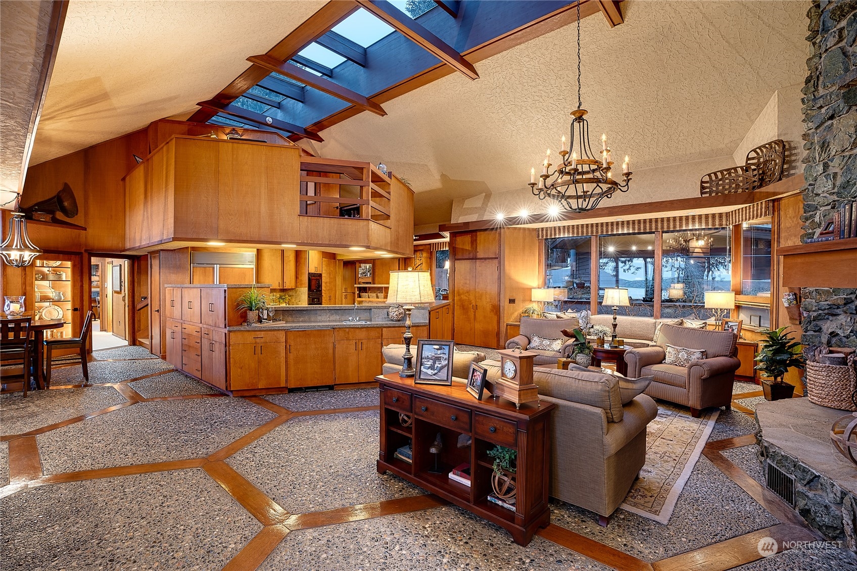 3559 Biz Point Road Anacortes, WA 98221 - Photo 5 of 37 a living room with lots of furniture and a chandelier