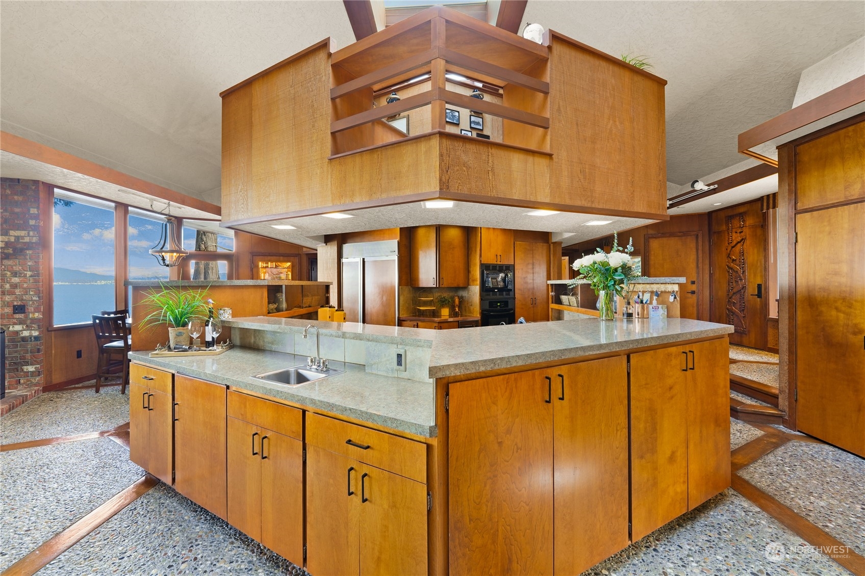 3559 Biz Point Road Anacortes, WA 98221 - Photo 9 of 37 a kitchen with stainless steel appliances granite countertop a sink and cabinets