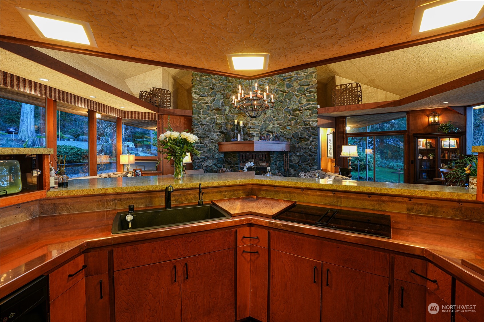3559 Biz Point Road Anacortes, WA 98221 - Photo 10 of 37 a kitchen with stainless steel appliances granite countertop a sink and cabinets