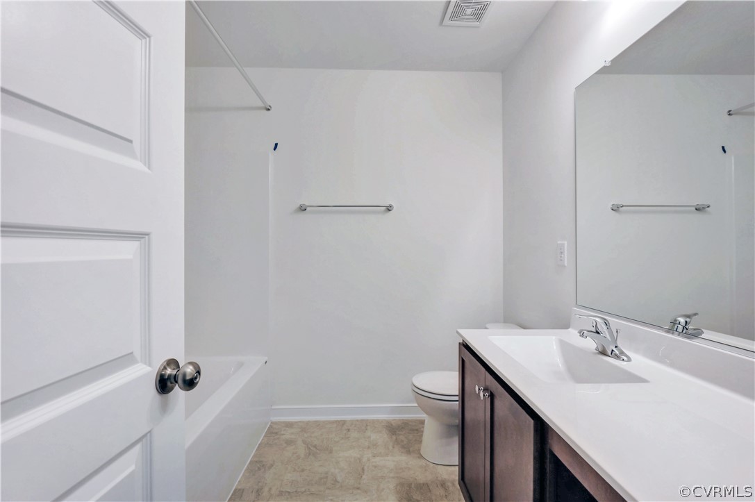 4208 Lind Lane Midlothian, VA 23112 - Photo 23 of 34 a bathroom with a sink toilet and shower