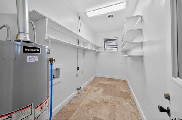 a view of a hallway with closet