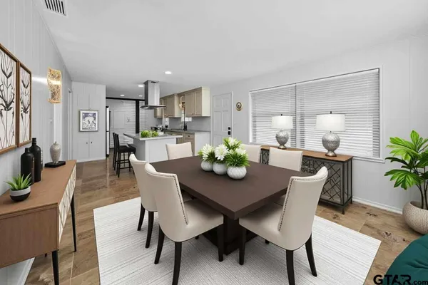 a view of a dining room with furniture