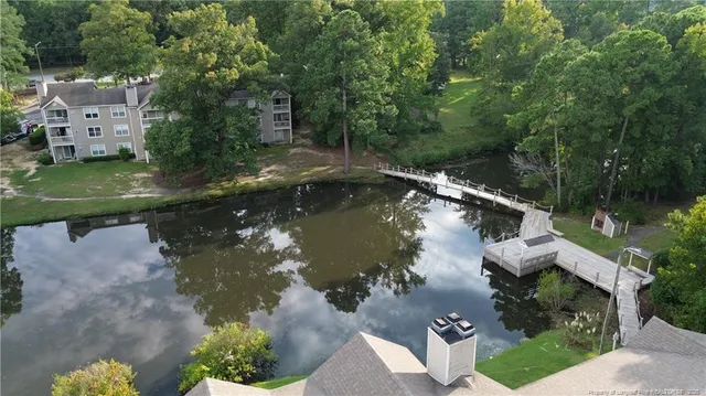 an aerial view of residential house with outdoor space