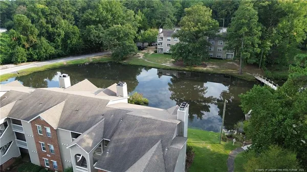 an aerial view of a house having lake view
