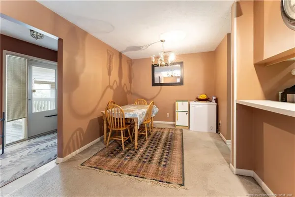 a view of a dining room with furniture
