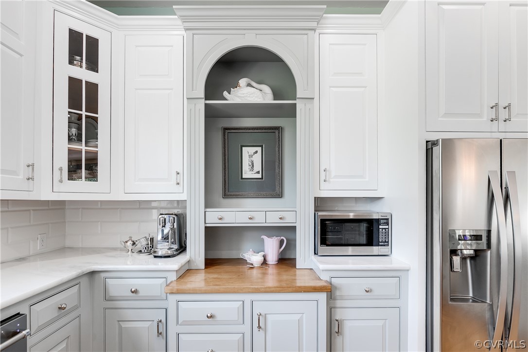 1720 Norwood Road Bruington, VA 23023 - Photo 14 of 50 a kitchen with cabinets stainless steel appliances and a counter space