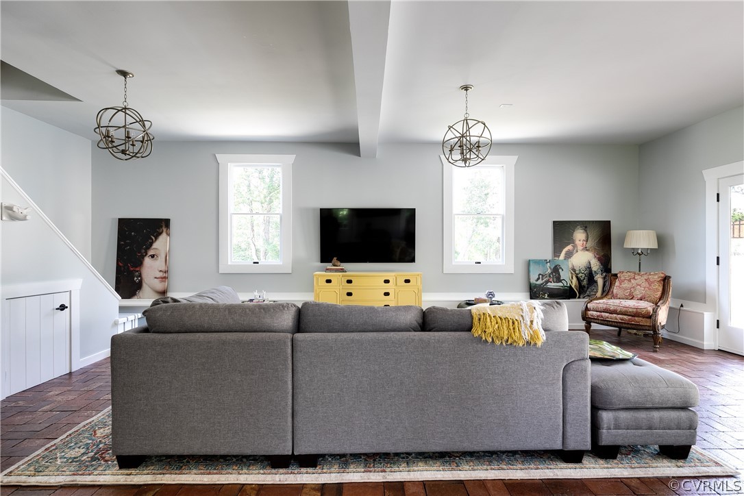 1720 Norwood Road Bruington, VA 23023 - Photo 22 of 50 a living room with furniture a flat screen tv and a window