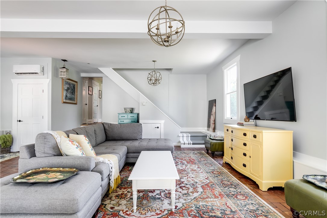 1720 Norwood Road Bruington, VA 23023 - Photo 23 of 50 a living room with furniture and a flat screen tv