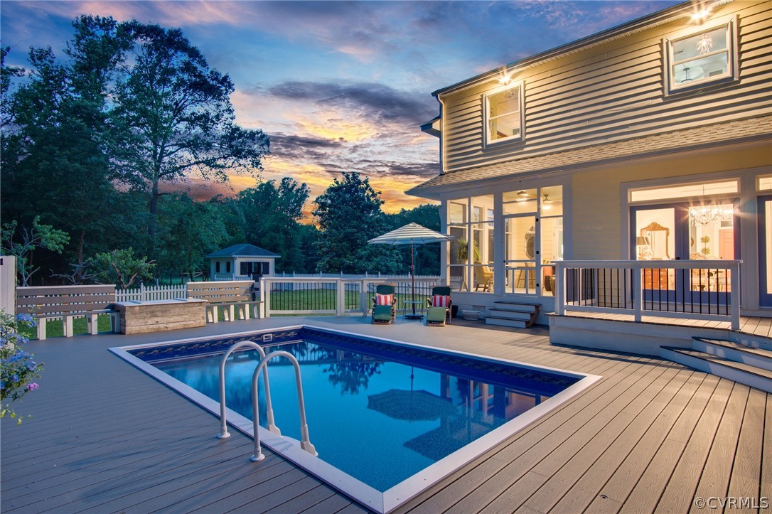1720 Norwood Road Bruington, VA 23023 - Photo 3 of 50 a view of a patio with swimming pool table and chairs