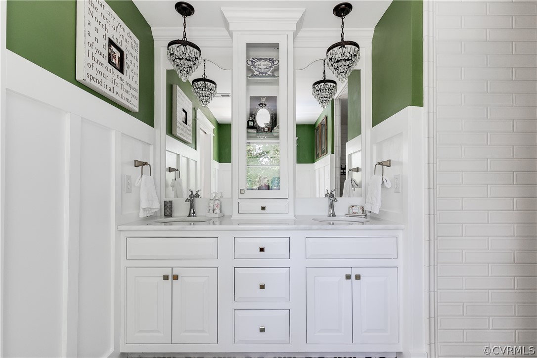 1720 Norwood Road Bruington, VA 23023 - Photo 38 of 50 a bathroom with a sink and a mirror