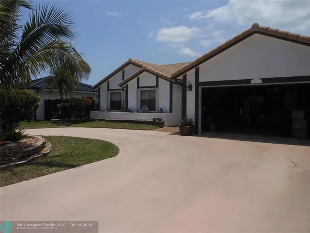 $665,000 | 8706 Northwest 83rd Street, Tamarac, FL 33321