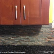 20145 Renfrew Road Detroit, MI 48221 - Photo 13 of 27 kitchen tile.jpg