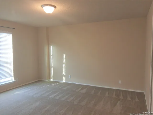 an empty room with an entryway