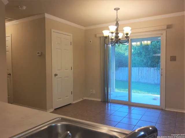 a view of a chandelier in a room