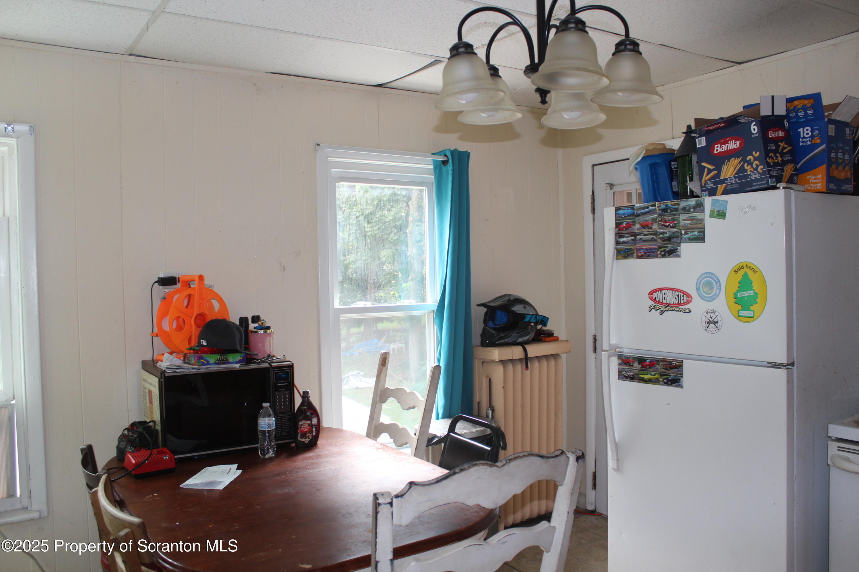 333 Spring Street Scranton, PA 18508 - Photo 18 of 43 a living room with furniture and a fireplace