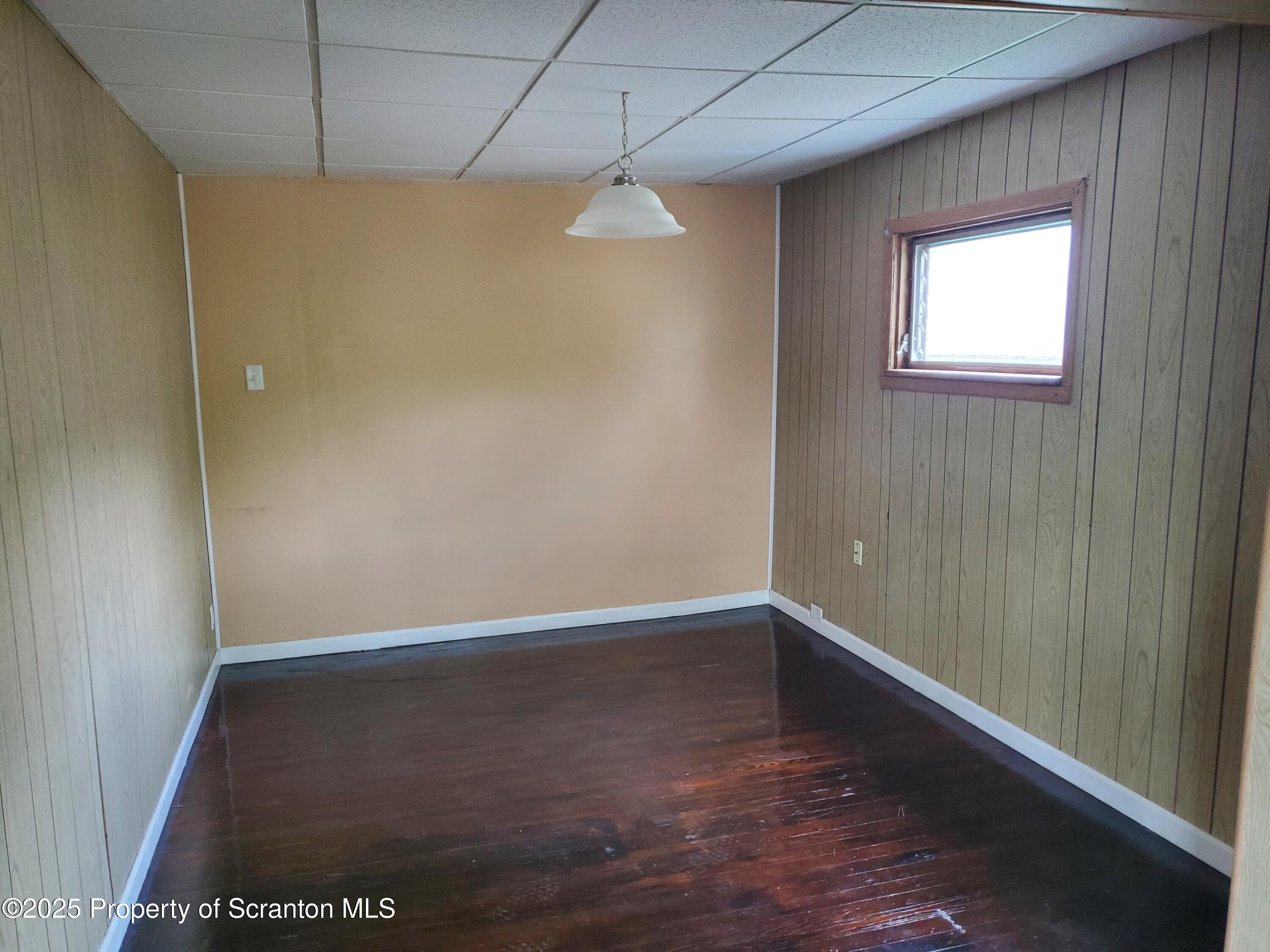 333 Spring Street Scranton, PA 18508 - Photo 23 of 43 a view of a room with wooden floor