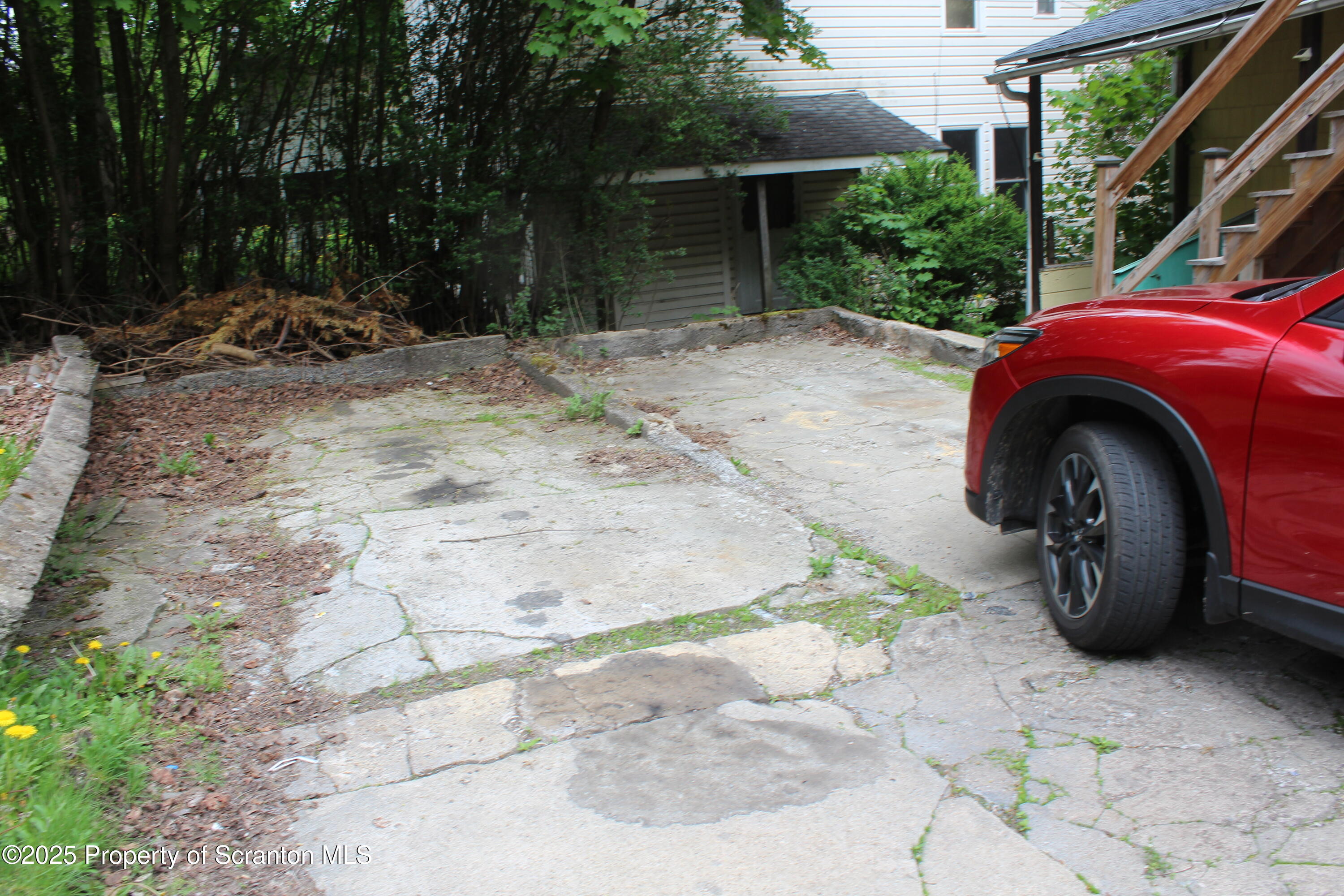 333 Spring Street Scranton, PA 18508 - Photo 25 of 43 a house with trees in front of it