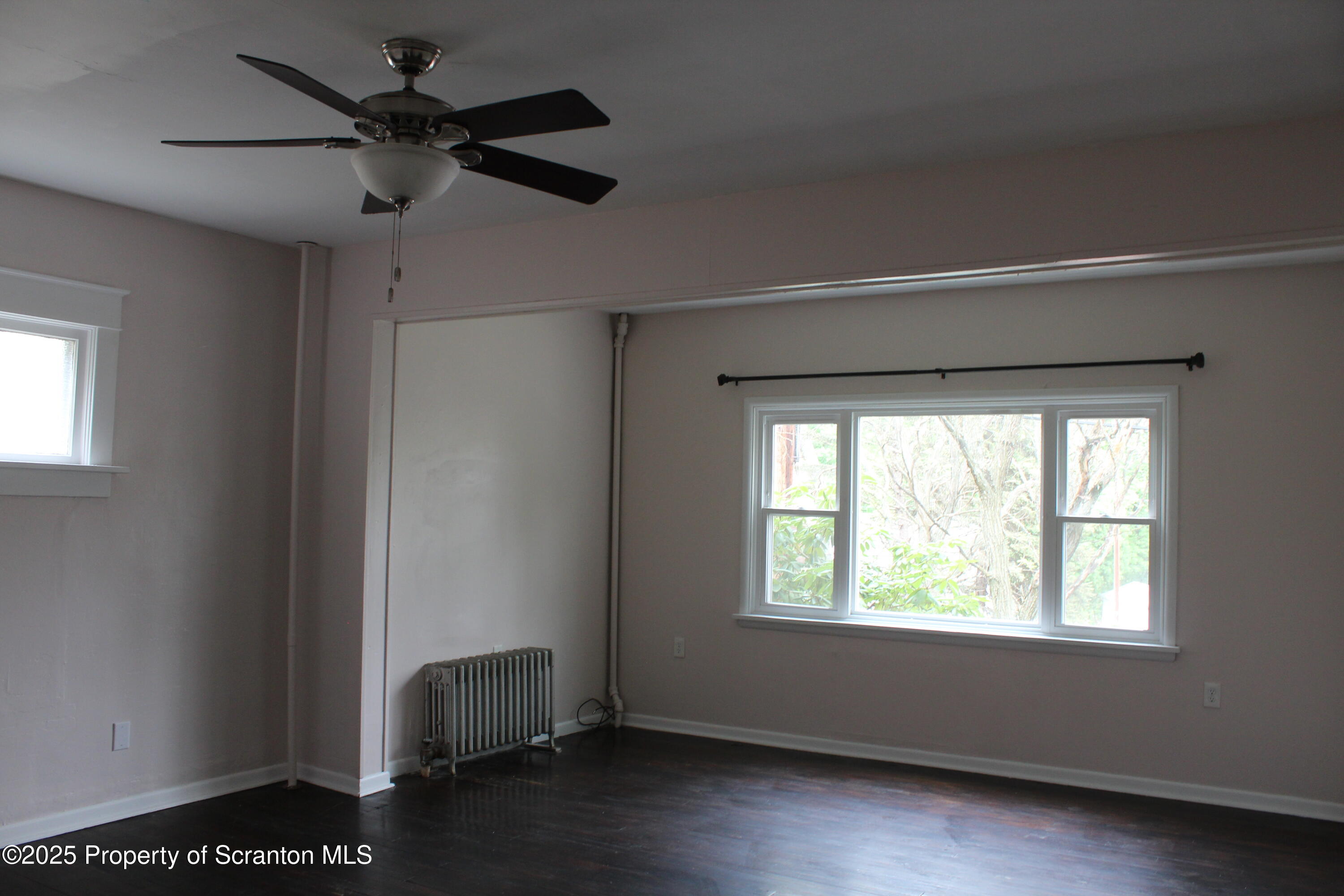 333 Spring Street Scranton, PA 18508 - Photo 26 of 43 a room with a window and a ceiling fan