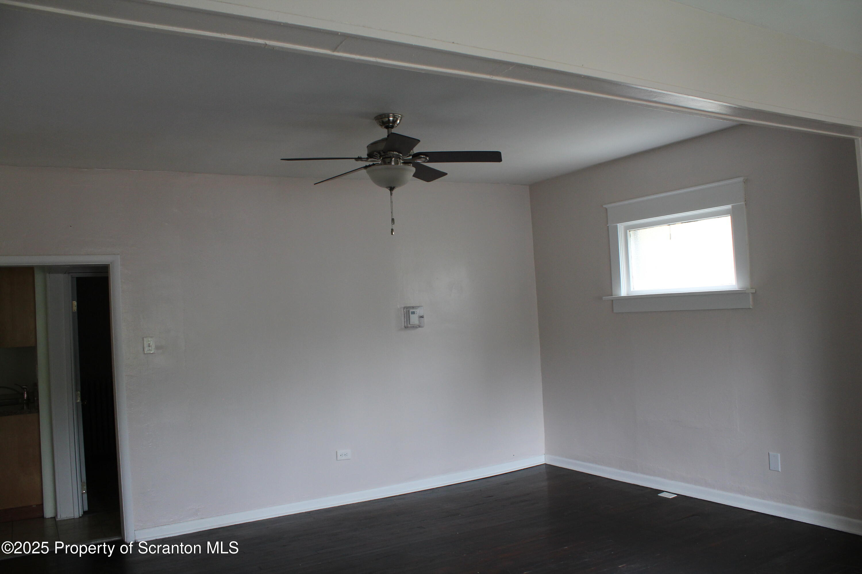 333 Spring Street Scranton, PA 18508 - Photo 27 of 43 a view of a small space with wooden floor and a window