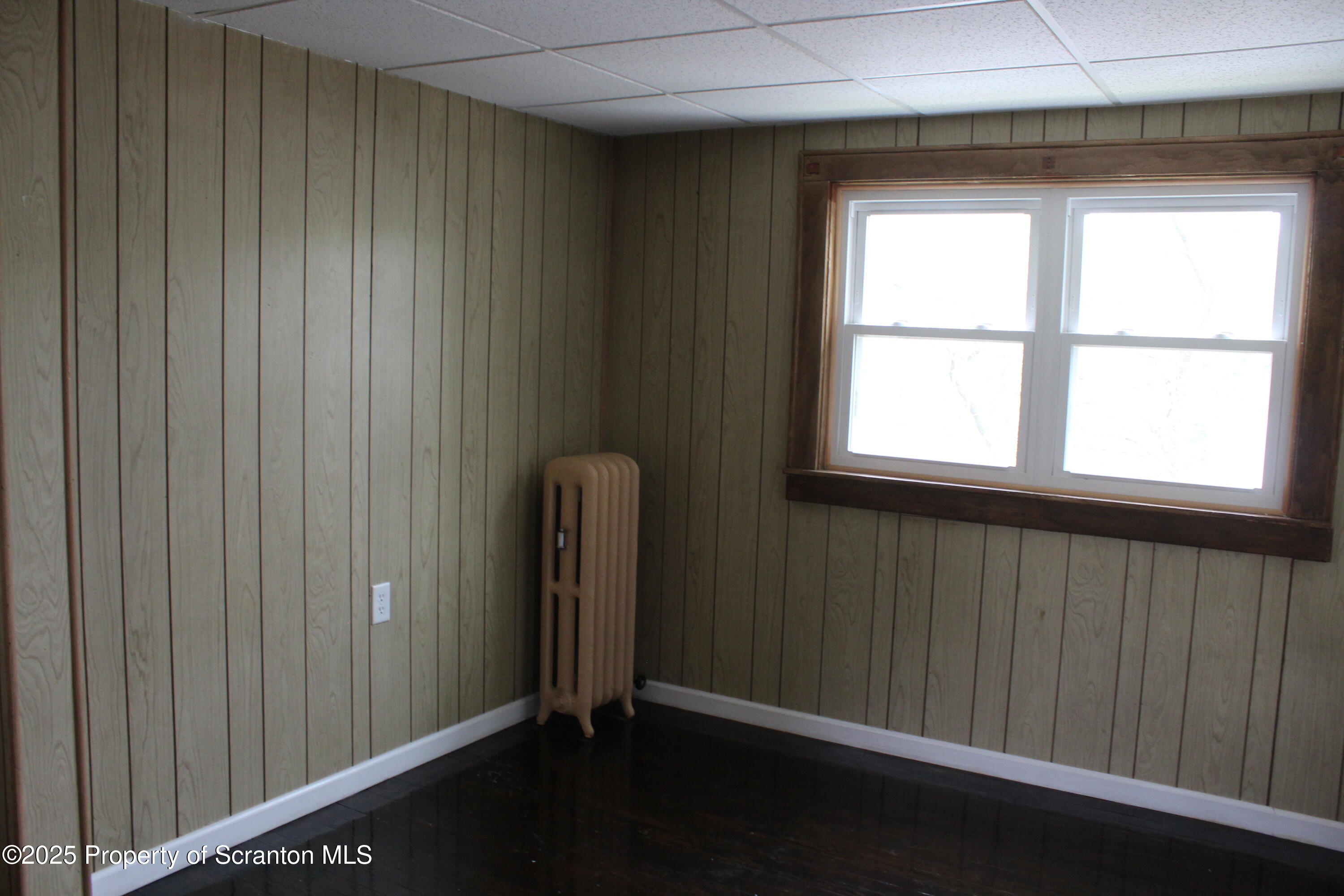 333 Spring Street Scranton, PA 18508 - Photo 31 of 43 a view of an empty room with a window