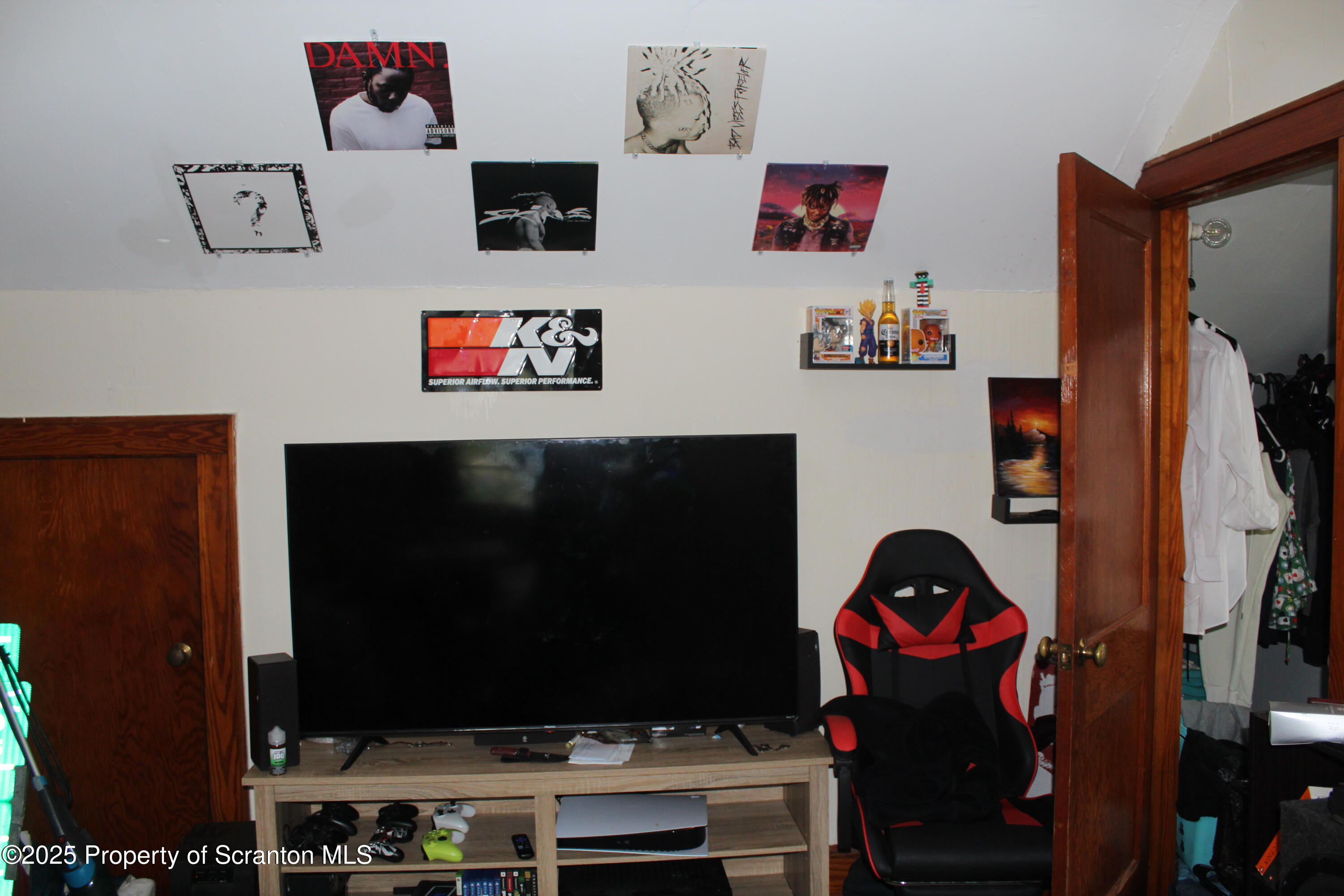 333 Spring Street Scranton, PA 18508 - Photo 35 of 43 a living room with furniture and a flat screen tv