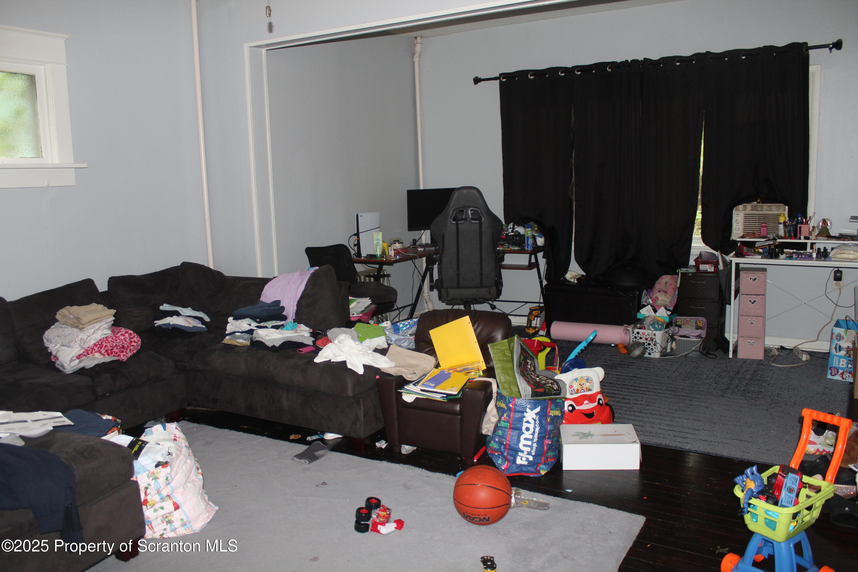 333 Spring Street Scranton, PA 18508 - Photo 36 of 43 a room with furniture and a flat screen tv