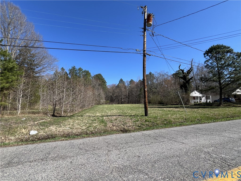 3610 Dupuy Road Petersburg, VA 23803 - Photo 3 of 4 a view of a road with a sign broad