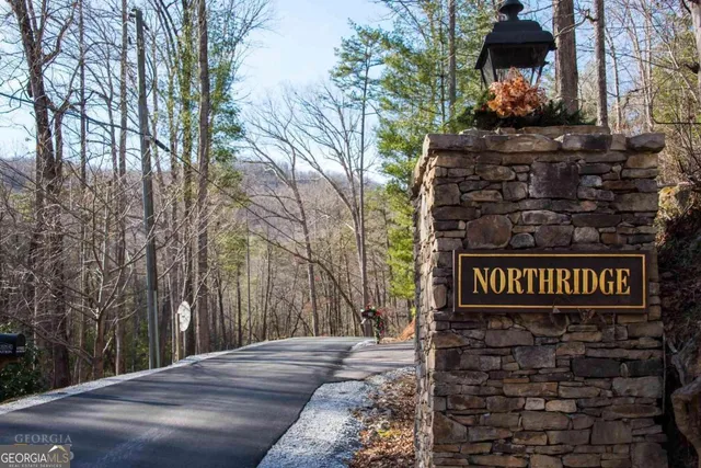 a street sign on a pole on a street