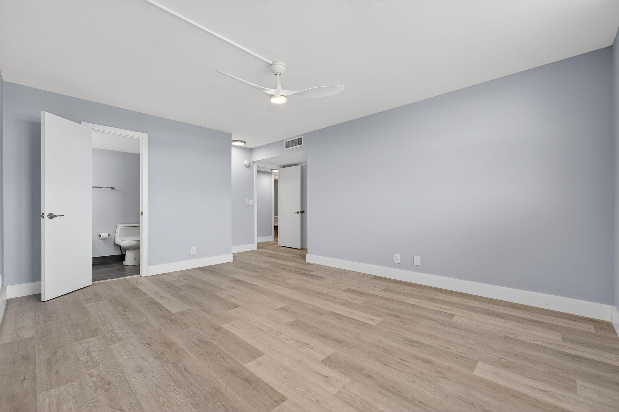 5500 Northwest 2nd Avenue, Unit 314 Boca Raton, FL 33487 - Photo 13 of 35 a view of empty room with wooden floor