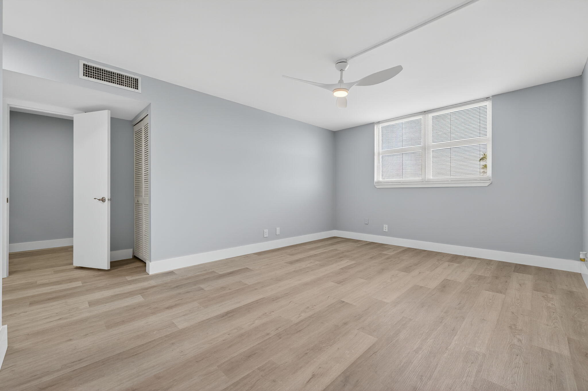 5500 Northwest 2nd Avenue, Unit 314 Boca Raton, FL 33487 - Photo 14 of 35 wooden floor in an empty room