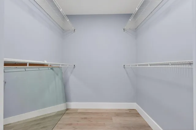 a view of a room with racks on the wall