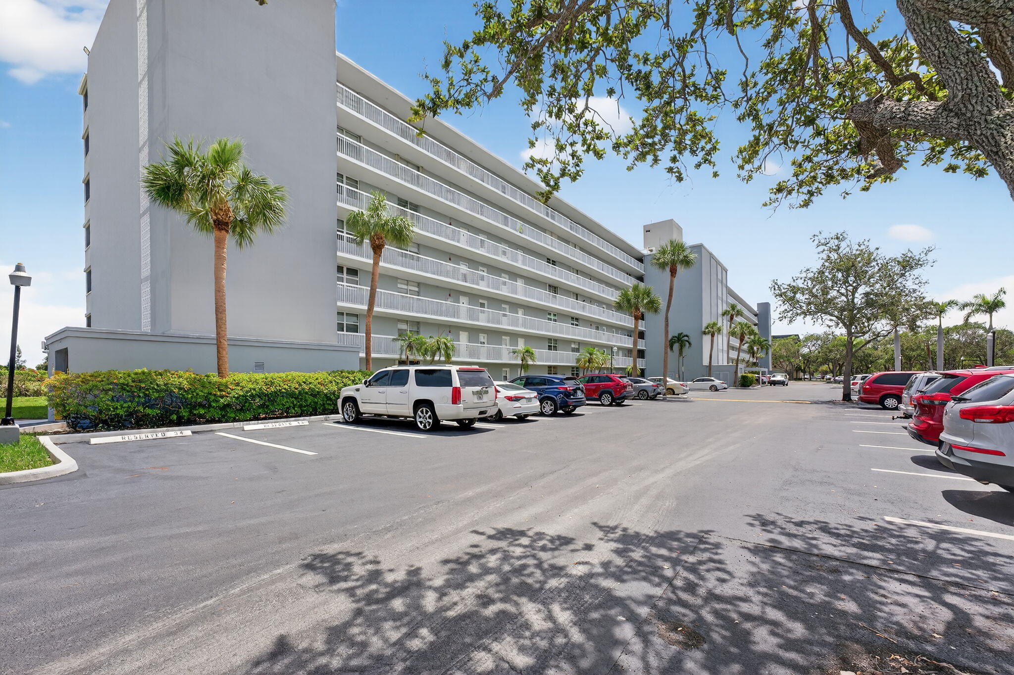 5500 Northwest 2nd Avenue, Unit 314 Boca Raton, FL 33487 - Photo 29 of 35 a view of road with card and parked cars