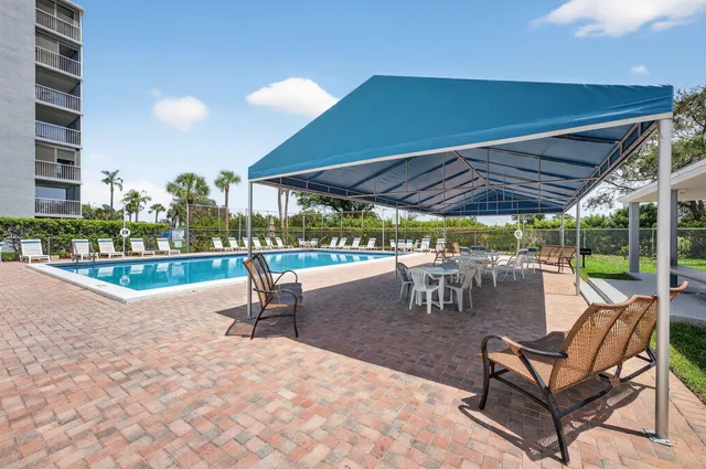 a view of a hallway with white walls