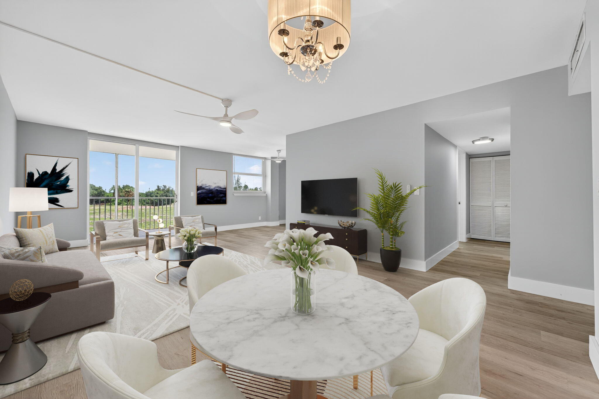 5500 Northwest 2nd Avenue, Unit 314 Boca Raton, FL 33487 - Photo 6 of 35 a living room with furniture and a flat screen tv