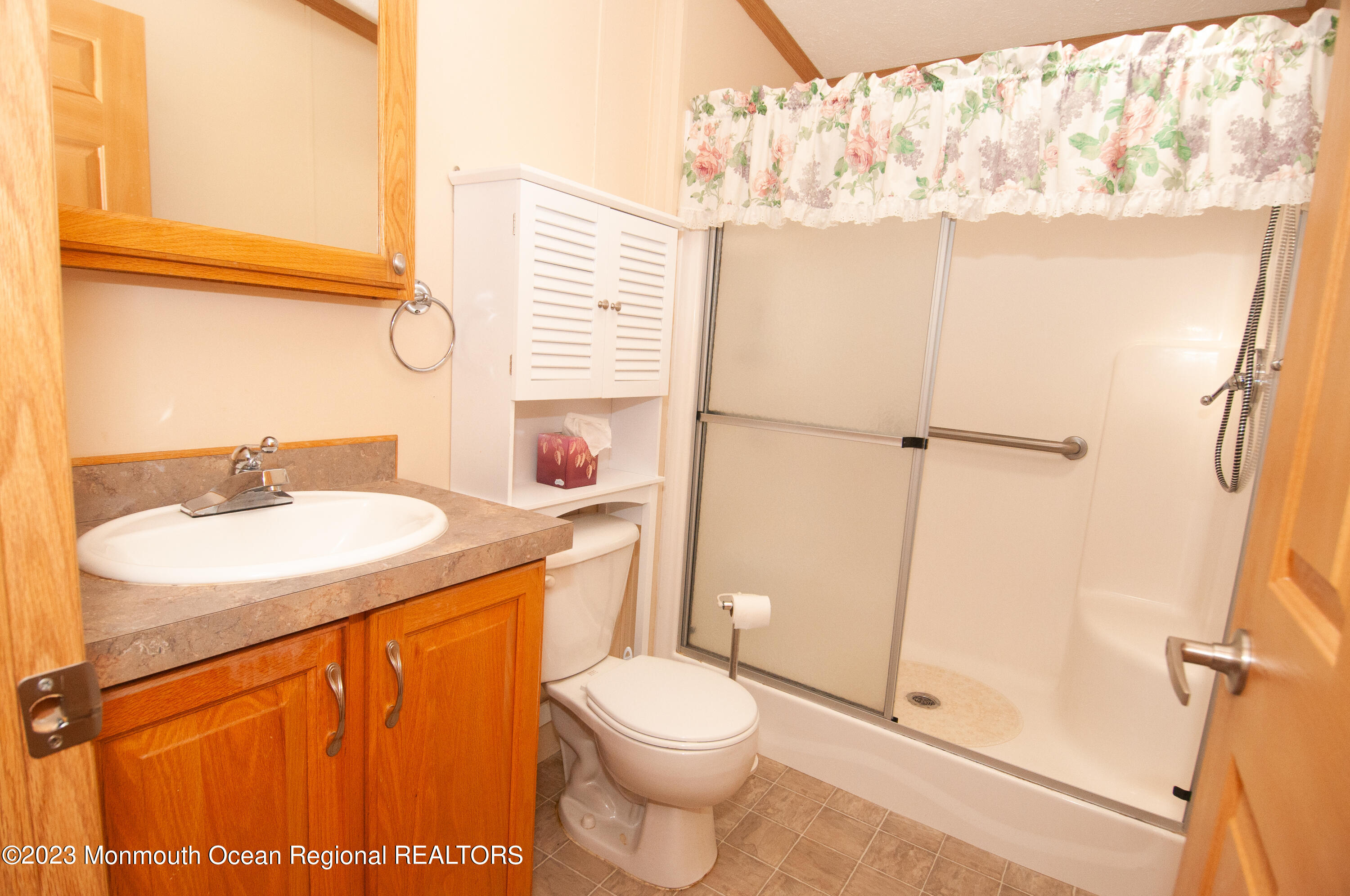 116 Woody Road Freehold, NJ 07728 - Photo 20 of 33 a bathroom with a sink toilet and shower